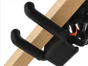 Hook holding the edge of a wood panel